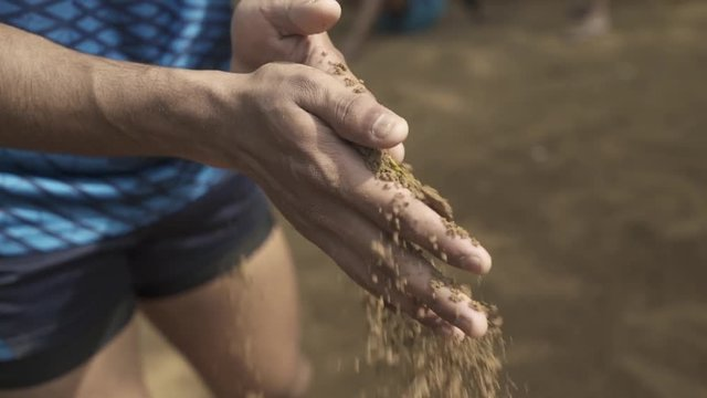 Why do kabaddi players rub their hands with soil?